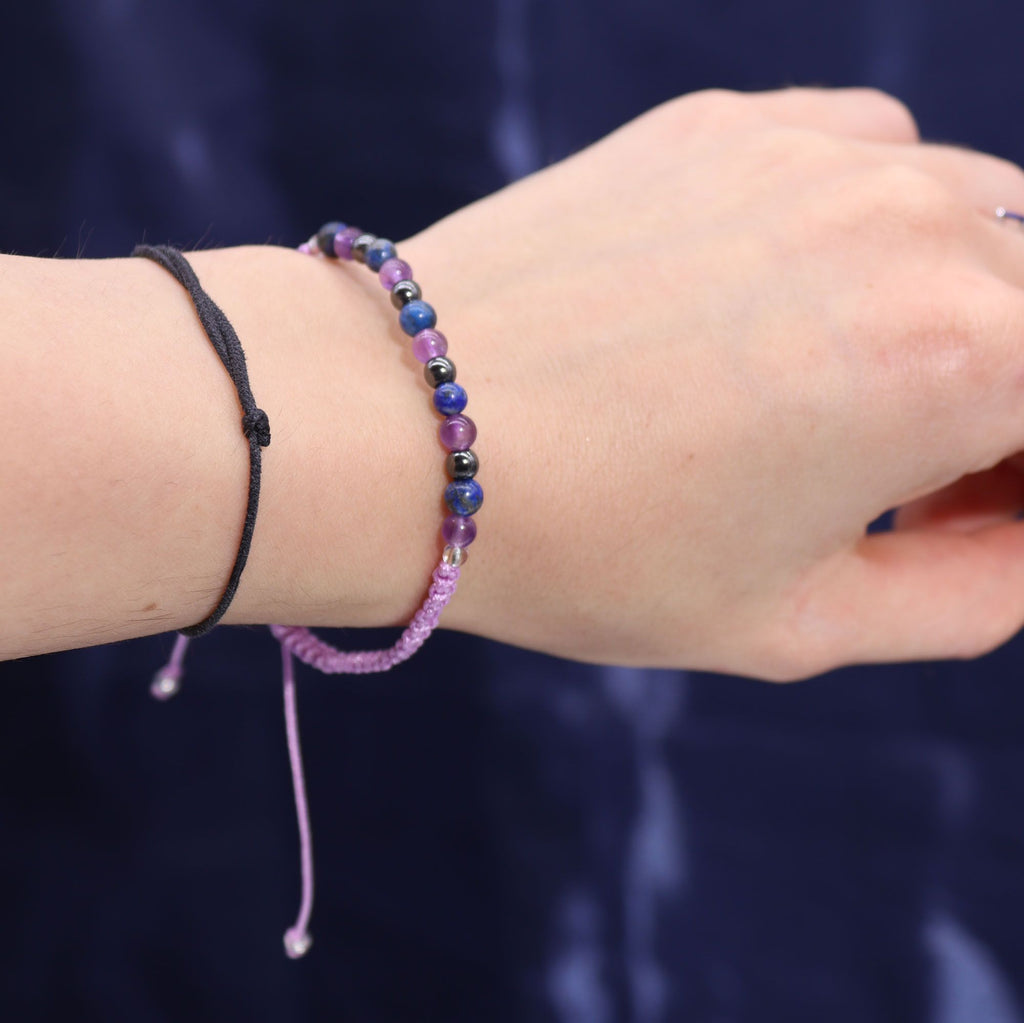 Sternzeichenkerze mit Edelsteinarmband – Wassermann