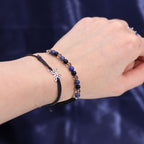 Sternzeichenkerze mit Edelsteinarmband – Skorpion